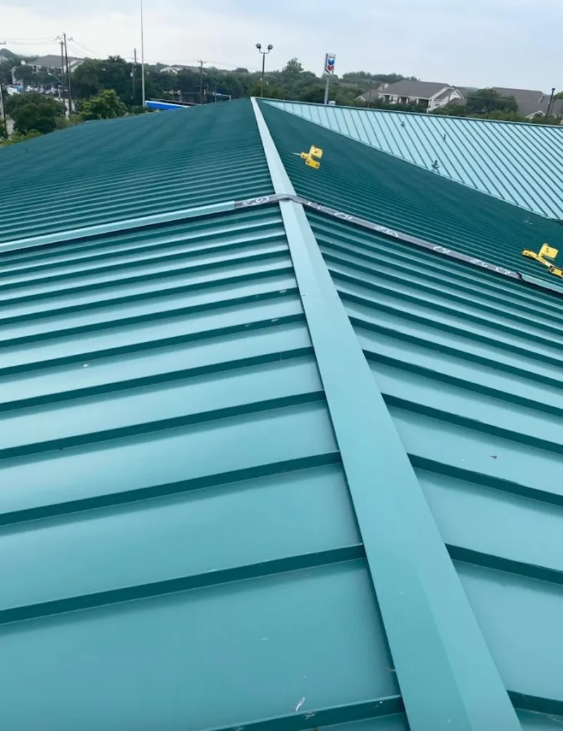 Green commercial metal roof ridge and valley for Metal Roof Repair in Charles City