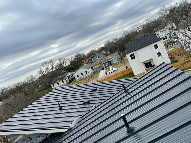 Standing seam metal roof panels with vents for Skylight Repair in Charles City